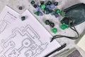 Tabletop role playing flat lay with RPG game dices, character sheet,dungeon map and pen