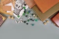 Tabletop roleplaying flat lay with RPG and game dices, rule book, notes and treasuremap on gray background with copy space Royalty Free Stock Photo
