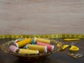 Tabletop with sewing materials in yellow. Copyspace on the light background. Royalty Free Stock Photo