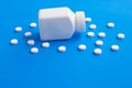 Tablets of Paracetamol on blue background
