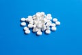 Tablets of Paracetamol on blue background