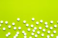 Tablets of Paracetamol on green background