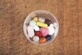 Tablets pills and medications on wooden spoon Royalty Free Stock Photo