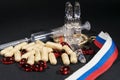 Tablets, pills and syringe of doping drugs or medicine with russian tape flag