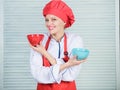 Tableware choice. culinary cuisine. cook in restaurant, uniform. professional chef cooking in kitchen. girl in apron and