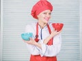 Tableware choice. culinary cuisine. cook in restaurant, uniform. professional chef cooking in kitchen. girl in apron and
