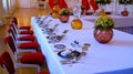 Tableware-serviced tables at the Rothmayer Hall ceremonial hall in Prague Castle Royalty Free Stock Photo