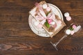 Tableware and silverware with puffy light pink roses Royalty Free Stock Photo