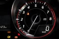 Tachometer showing zero revolutions per minute on the car dashboard Royalty Free Stock Photo