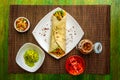 Taco, with guacamole, chile, pico de gallo and aj