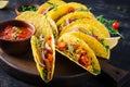 Taco. Mexican tacos with beef meat, corn and salsa. Royalty Free Stock Photo