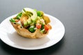 Taco salad in tortilla bowl Royalty Free Stock Photo