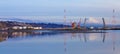 Tacoma port with oil tanks and Mountains. Royalty Free Stock Photo