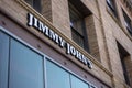 Tacoma, WA USA - circa August 2021: Low angle view of a Jimmy John`s sandwich shop in downtown Tacoma