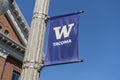 Tacoma, WA USA - circa August 2021: Low angle view of a University of Washington Tacoma banner on a light post on the city campus