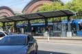 Tacoma, WA USA - circa August 2021: Street view of people leaving and boarding a Sound Transit electric rail bus in the downtown
