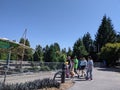 Tacoma, WA USA - circa August 2021: View of families walking around, enjoying a sunny day at the Point Defiance Zoo Park