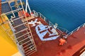 Tacoma, WA, USA, October, 23-25, 2019. Repainting the shipÃ¢â¬â¢s funnel and drawing the logo of the shipowner with m Royalty Free Stock Photo