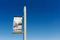 Tacoma, Washington, USA. March 2021. A banner with the inscription Foss Waterway on the lighting mast against the blue sky