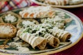 Tacos dorados, flautas de pollo, chicken tacos and spicy Salsa Homemade Mexican food in mexico Royalty Free Stock Photo