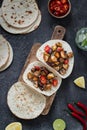 Tacos with grilled mushrooms, Spanish spicy sausage chorizo, Mexican tortillas, Cypriot cheese halloumi, hot chilly, dried oregano Royalty Free Stock Photo