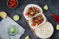 Tacos with grilled mushrooms, Spanish spicy sausage chorizo, Mexican tortillas, Cypriot cheese halloumi, hot chilly, dried oregano Royalty Free Stock Photo