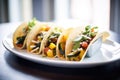 tacos with grilled veggies and feta cheese, focus on cheese crumbles Royalty Free Stock Photo