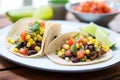 tacos with a side of spicy black bean and corn salsa Royalty Free Stock Photo