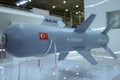 Tactical air-to-ground missiles designed for military unmanned aerial vehicles placed on a stand, made by Roketsan