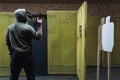 Tactical shooting from modern firearms at a shooting range. A man holds a carbine pistol in his hand Royalty Free Stock Photo