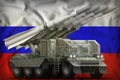 Tactical short range ballistic missile with arctic camouflage on the Russia national flag background. 3d Illustration