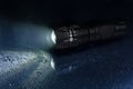 Tactical waterproof flashlight Royalty Free Stock Photo