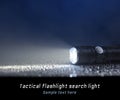 Tactical waterproof flashlight Royalty Free Stock Photo