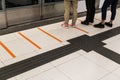 Tactile paving foot path for the blind subway station Royalty Free Stock Photo