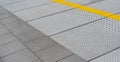 Tactile Paving on Modern Tiles Pathway for Blind Handicap, Safety Sidewalk Walkway for Disability People Royalty Free Stock Photo