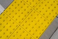 Tactile Paving on Modern Tiles Pathway for Blind Handicap, Safety Sidewalk Walkway for Disability People Royalty Free Stock Photo