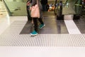 Tactile paving path for the blind entrance exit of escalator Royalty Free Stock Photo