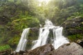 Tad Sua waterfall, A big waterfall in deep forest at Bolaven Plateau. Royalty Free Stock Photo