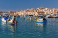 Taditional eyed boats Luzzu in Marsaxlokk, Malta Royalty Free Stock Photo