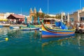 Taditional eyed boats Luzzu in Marsaxlokk, Malta Royalty Free Stock Photo