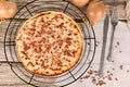 Taditional food `Tarte Flambee` or `Flammkuchen` from German-French Alsace border regiones,