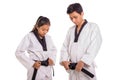 Tae-kwon-do masters dress up before training session Royalty Free Stock Photo