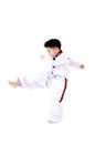 Taekwondo action by a asian cute boy Royalty Free Stock Photo