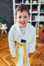 Boy exercising at home in living room Royalty Free Stock Photo