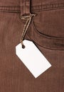 Tag on brown jeans Royalty Free Stock Photo
