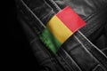 Tag on dark clothing in the form of the flag of the Mali