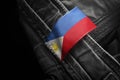 Tag on dark clothing in the form of the flag of the Philippines