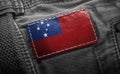 Tag on dark clothing in the form of the flag of the Samoa