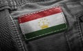 Tag on dark clothing in the form of the flag of the Tajikistan