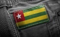 Tag on dark clothing in the form of the flag of the Togo